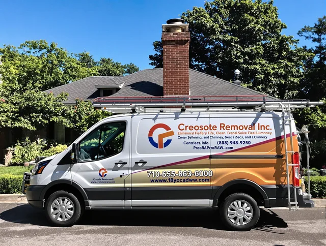 Madison Chimney Sweep technician removing creosote safely in Madison, CT